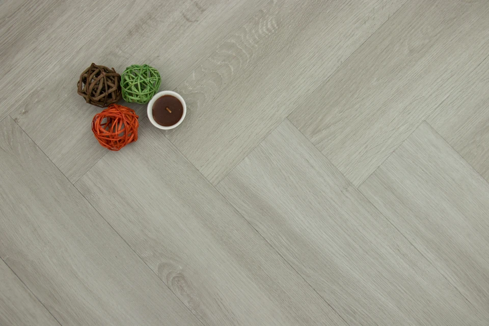 Supremo Luxury Click Vinyl Rigid Core Herringbone Flooring Graphite With Built In Underlay 6mm By 127mm By 610mm 1 Supremo Luxury Click Vinyl Rigid Core Herringbone Flooring Graphite With Built In Underlay 6mm By 127mm By 610mm